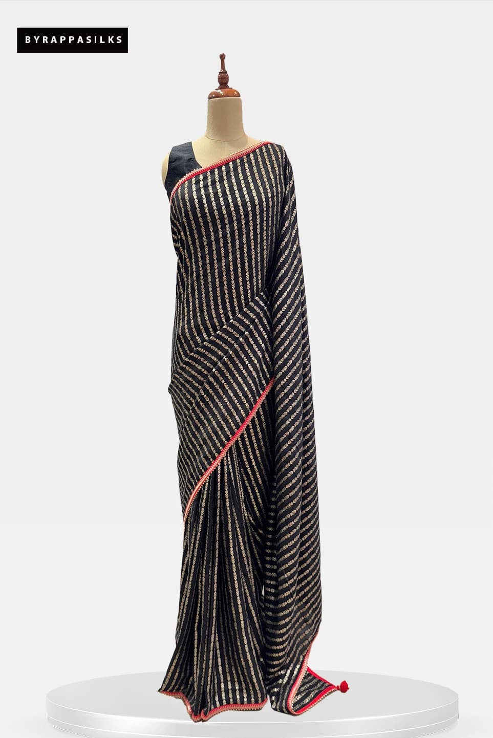 Fancy Elegant Black & Gold Striped Saree with Contrast Red Border QS289951